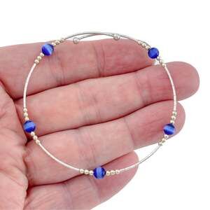 1990's Sterling Silver Blue Cat’s Eye Glass Bead Flexible Wrap Bracelet 7.5 inch
